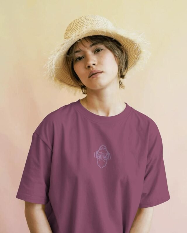 Guru Daddy Red Voilet tee on model with straw hat