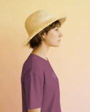 Guru Daddy Red Voilet tee - female side profile with straw hat