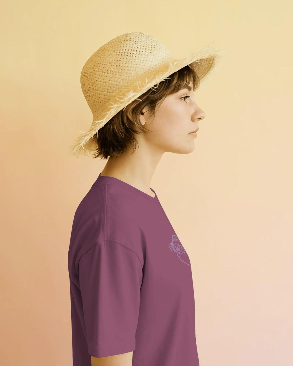 Guru Daddy Red Voilet tee - female side profile with straw hat